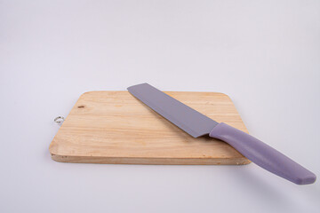 Close-up - knife on a wooden board,white background