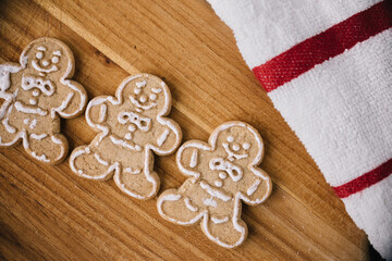 Christmas Gingerbread Man Cookies on Wooden Board