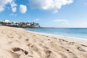 Sunny beach in, costa Teguise, Lanzarote, Canary Islands, Spain.