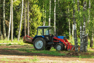 Tractor working in the forest