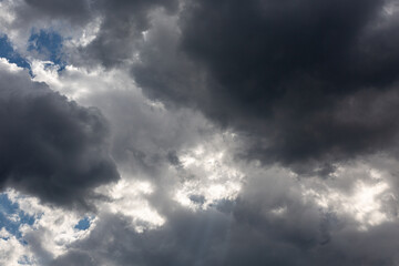Dark sky and clouds with light beams