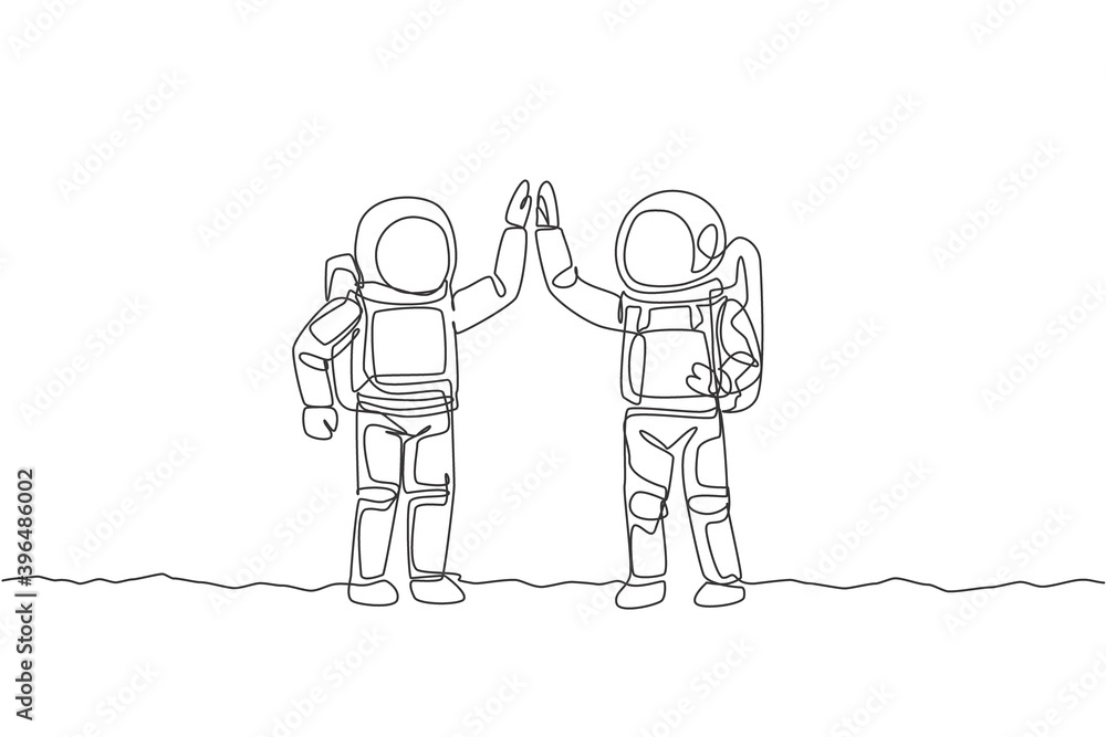 Aufkleber one continuous line drawing of two young happy astronauts giving high five gesture to celebrate team