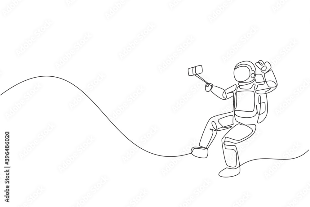 Poster single continuous line drawing of young astronaut doing selfie shoot while floating in outer space. 