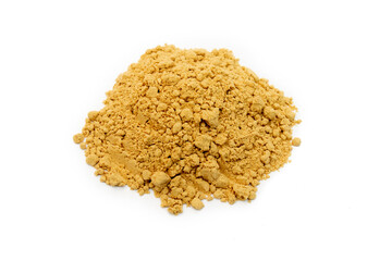 Ground ginger powder on a white background. Fresh dried spice used in medicine, drinks and food.