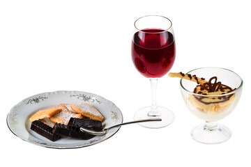 Mousse from mango, cranberry mors, chocolate sweets and biscuits © Mikhail