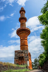 the chand minar is medieval tower in Daulatabad, india.  it was erected in 1445 C.E. by king Alauddin Bahmani to commemorate his capture the fort. 