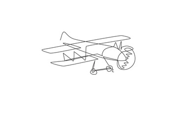 Fototapeta na wymiar Single continuous line drawing of retro biplane flying on the sky. Airplane vehicle for war concept. Trendy one line draw design vector graphic illustration