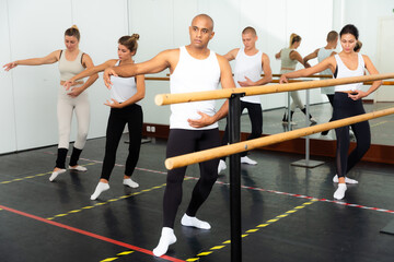 Fototapeta na wymiar Ballet troupe performing dance in gum