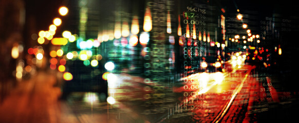 Fototapeta na wymiar index number of trade stock market on glow blur road city light banner business background