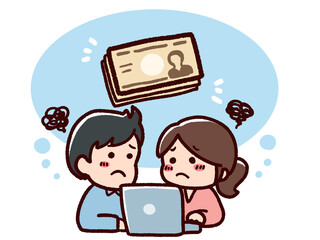 パソコンを見る夫婦とお金　悩み