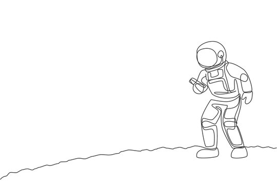 One Single Line Drawing Of Cosmonaut  In Moon Surface Make A Call To Family In Earth With Smartphone Vector Illustration. Astronaut Business Office With Outerspace Concept. Continuous Line Draw Design