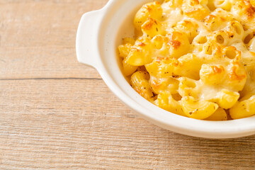 American mac and cheese, macaroni pasta in cheesy sauce