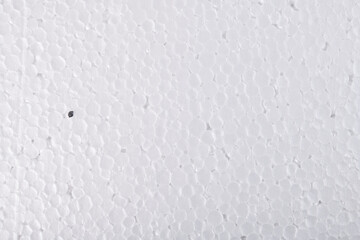 White Styrofoam Background Texture.Closeup detail of white abstract polystyrene foam texture background.
