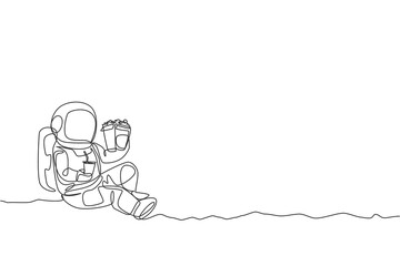 Single continuous line drawing of spaceman sitting relax on moon surface while eating french fries and drinking soft soda. Outer space life concept. Trendy one line draw design vector illustration