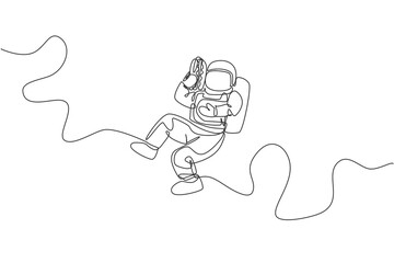 Single continuous line drawing of spaceman holding and eating delicious hot dog in nebula galaxy. Fantasy fiction of outer space life concept. Trendy one line draw graphic design vector illustration