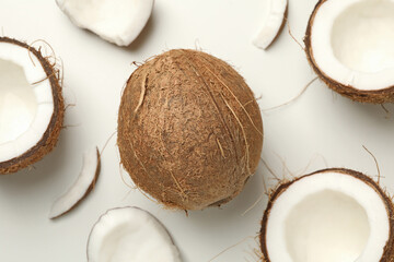 Fresh tasty coconut on white background, top view