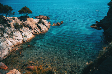 Seascape of a beautiful small cove with shallow crystalline waters