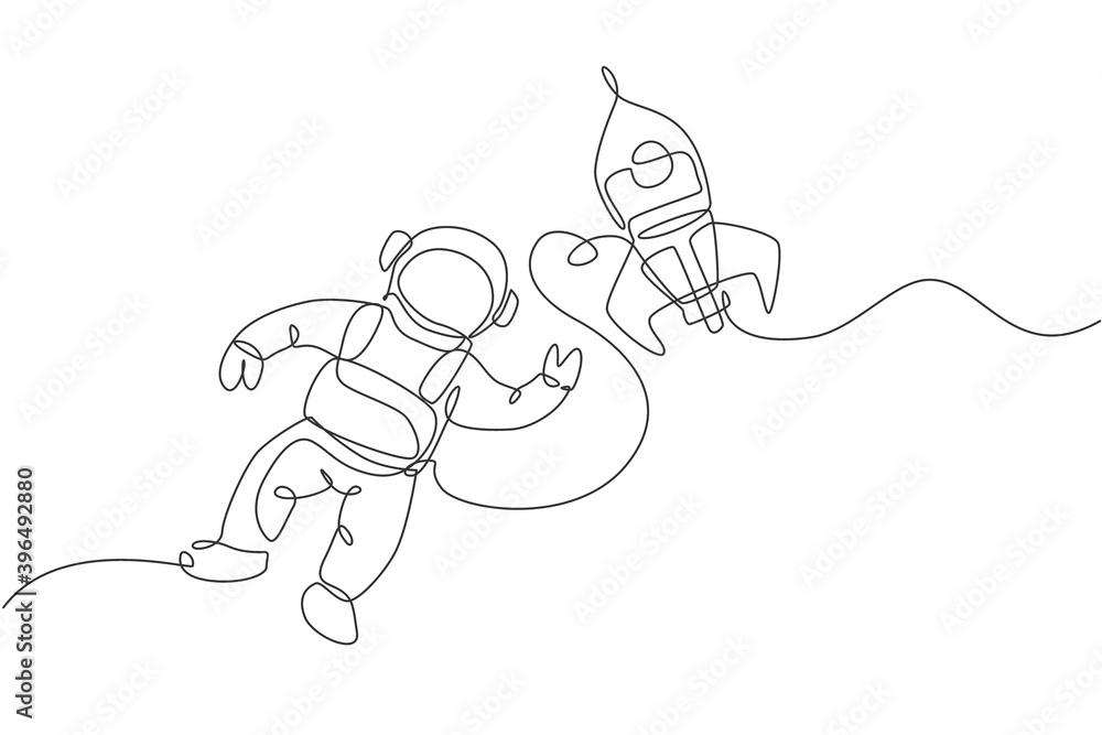 Wall mural one single line drawing of astronaut in spacesuit floating and discovering deep space with rocket sp