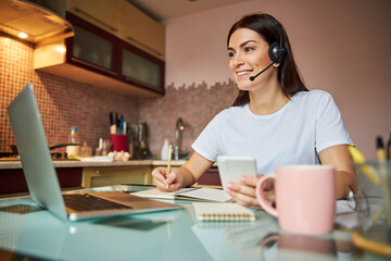 Female rewriting the data from her phone