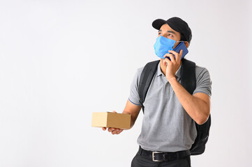 Courier boy taking instructions for delivering the package on call	