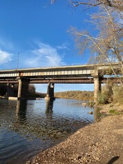 Fototapeta na wymiar bridge over river in the park