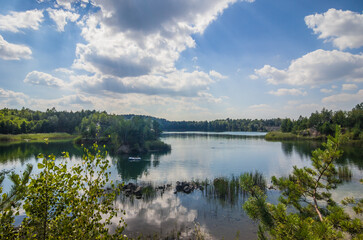 A picturesque lake located in a former basalt quarry. Pure water and wonderful nature. Basalt...