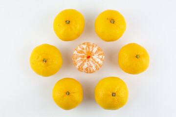 beautiful ripe tangerines on a white background