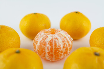 beautiful ripe tangerines on a white background