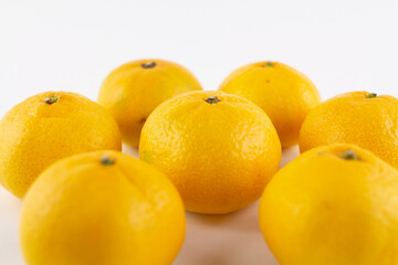 beautiful ripe tangerines on a white background