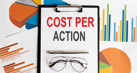 Cost Per Action . Conceptual background with chart ,papers, pen and glasses, business concept