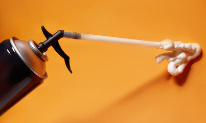 Spray can of professional construction foam. Pu-foam, tube with building sealant for fixing or...