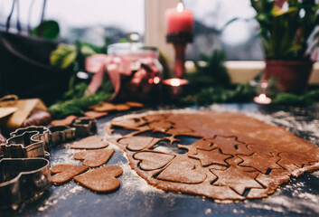 Christmas and New Year holidays, family celebration traditions. Mother cooking festive homemade sweets. Ingredients for cooking Christmas baking.