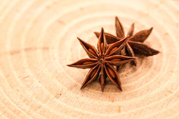 Star anise spice on wooden background