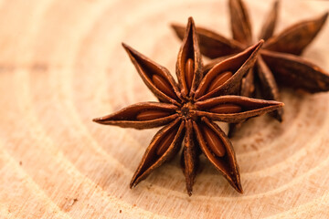 Star anise spice on wooden background