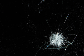 cracks on black glass background, broken abstract glass hole destruction concept - obrazy, fototapety, plakaty