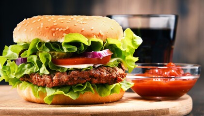 Homemade hamburger with cheese and fresh vegetables
