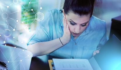 Surprised businesswoman looking at document; light effect