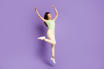 Fototapeta na wymiar Full length body size view of her she nice-looking attractive lovely slender cheerful cheery girl jumping dancing enjoying rest party isolated bright vivid shine vibrant lilac violet color background
