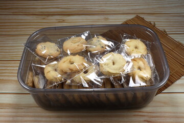 Pile of baked cookie in the plastic bag. Famous traditional sweet dessert and snack in Asia. 