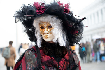 Fototapeta na wymiar Colorful carnival beautiful masks at a traditional festival in Venice, Italy.
