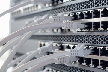 Working switches in data center with white cables
