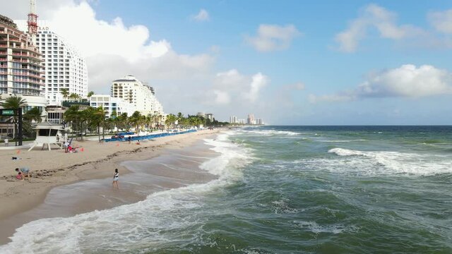 waves rolling in fort lauderdale beach in florida, visit travel to the ocean tropical vibes