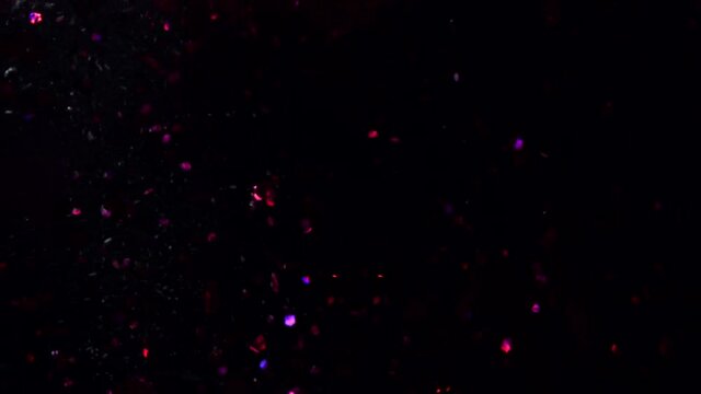 What you are about to watch is not noise, or video artifacts. It is glitter placed in water in front of a black background.