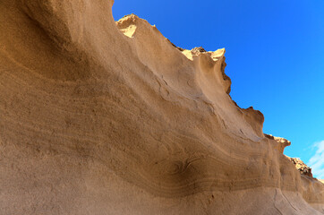 Gran Canaria, amazing sand stone erosion figures in ravines on Punta de las Arenas cape on the western part of the island, also called Playa de Artenara
