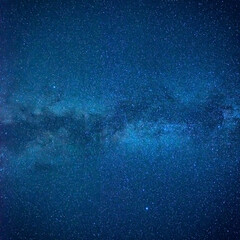 Night dark blue sky with many stars and milky way galaxy