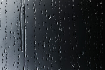 Rain drops on glass textured background