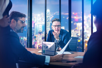 Businessmen discussing in meeting room corporate background