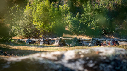 Old vintage stone made bridge over dry river