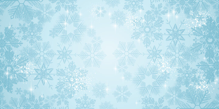 Blue winter snowflakes on a blue background - Merry Christmas and winter snow design banner