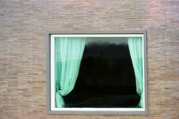 glass window on brick wall